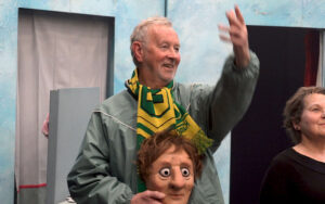 Tim in his costume with Norwich City scarf